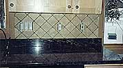 4x4 Marble Tile installed on Kitchen backsplash.